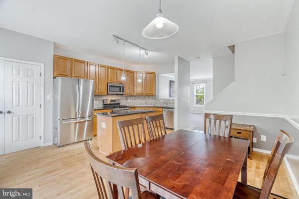 Dining room, Interior, Kitchen, Pendant Lights, Stainless Steel Appliances, Wood Texture Flooring