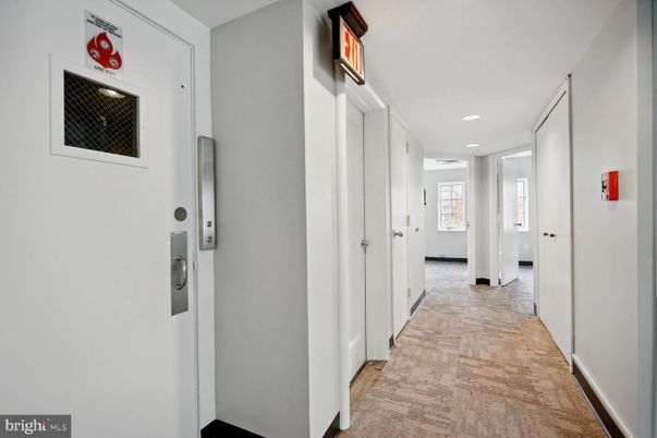 Elevator, Interior, Recessed Lighting, Wood Texture Flooring