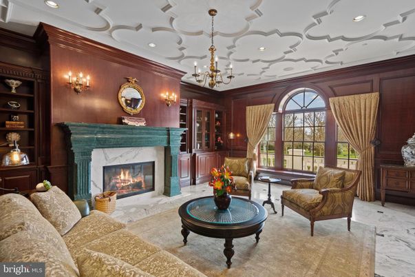 Chandelier, Fireplace, Interior, Living room, Marble, Recessed Lighting, Wooden Walls