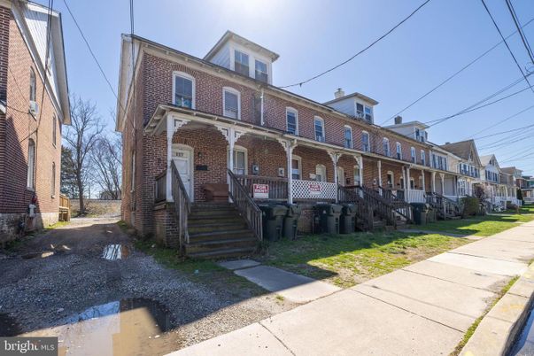 Exterior, Facade, Brick Facade, American Foursquare