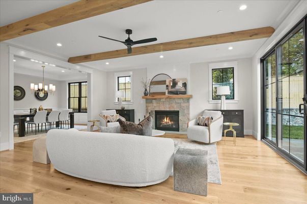 Chandelier, Dining room, Fireplace, Interior, Living room, Recessed Lighting, Wooden Beams, Wood Texture Flooring