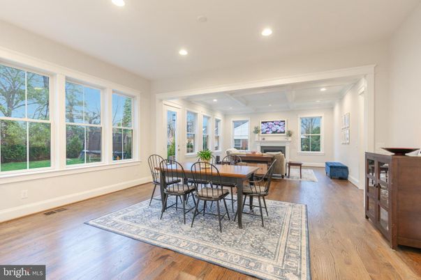 Dining room, Fireplace, Interior, Living room, Recessed Lighting, Wood Texture Flooring