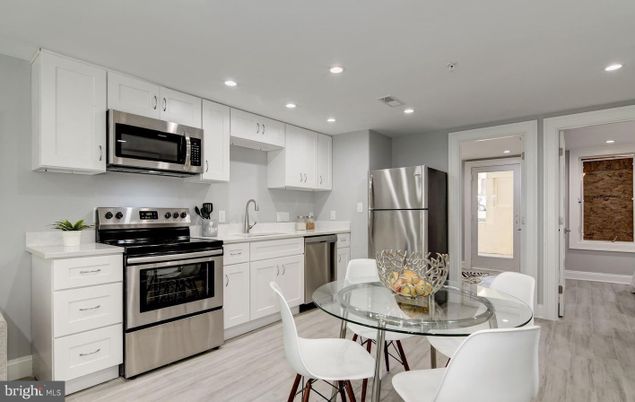Dining room, Interior, Kitchen, Recessed Lighting, Stainless Steel Appliances, Wood Texture Flooring