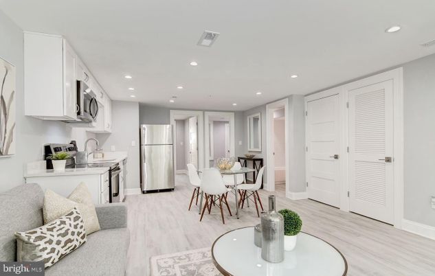 Dining room, Interior, Kitchen, Recessed Lighting, Stainless Steel Appliances, Wood Texture Flooring
