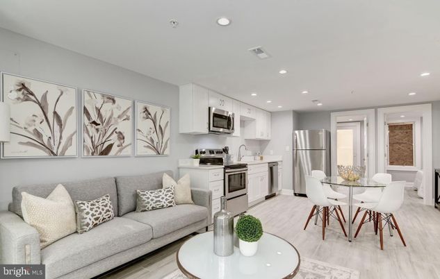 Dining room, Interior, Kitchen, Living room, Recessed Lighting, Stainless Steel Appliances, Wood Texture Flooring