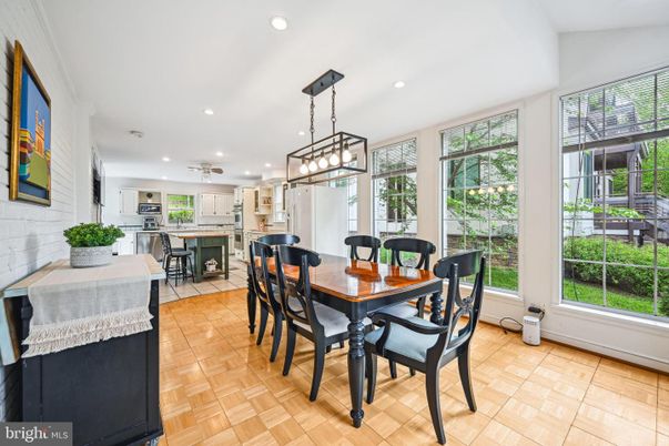 Dining room, Interior, Kitchen, Pendant Lights, Recessed Lighting, Stainless Steel Appliances, Wood Texture Flooring