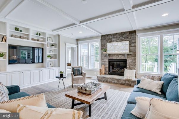 Fireplace, Interior, Living room, Recessed Lighting, Stone Walls, Wood Texture Flooring