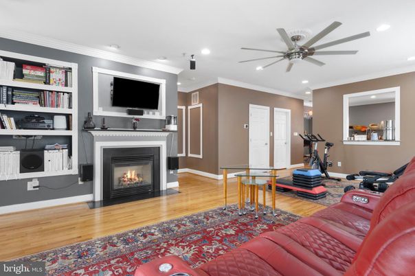Fireplace, Fitness Equipment, Interior, Recessed Lighting, Wood Texture Flooring