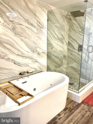 Bathroom, Free Standing Baths, Glass Shower, Interior, Marble Walls, Wood Texture Flooring