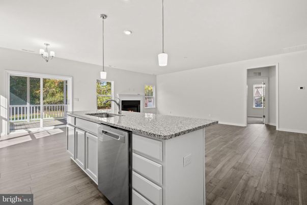 Chandelier, Fireplace, Interior, Kitchen, Pendant Lights, Recessed Lighting, Wood Texture Flooring