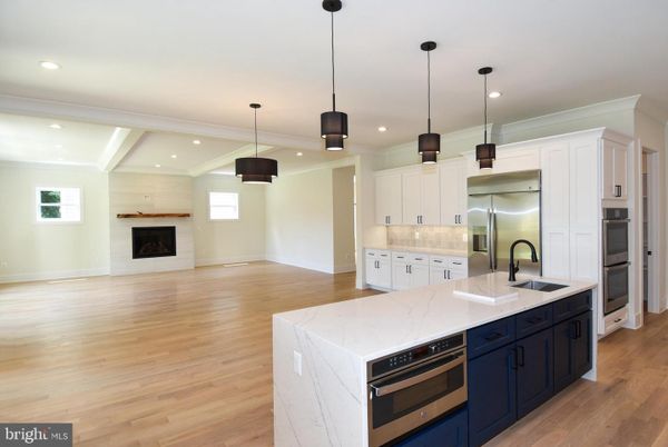 Fireplace, Interior, Kitchen, Pendant Lights, Recessed Lighting, Stainless Steel Appliances, Wood Texture Flooring