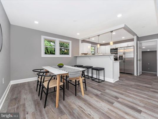 Dining room, Interior, Kitchen, Pendant Lights, Recessed Lighting, Stainless Steel Appliances, Wood Texture Flooring