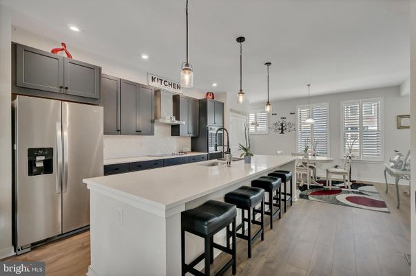 Dining room, Interior, Kitchen, Pendant Lights, Recessed Lighting, Stainless Steel Appliances, Wood Texture Flooring