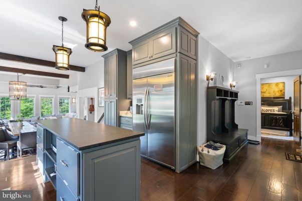 Dining room, Interior, Kitchen, Pendant Lights, Recessed Lighting, Stainless Steel Appliances, Wood Texture Flooring