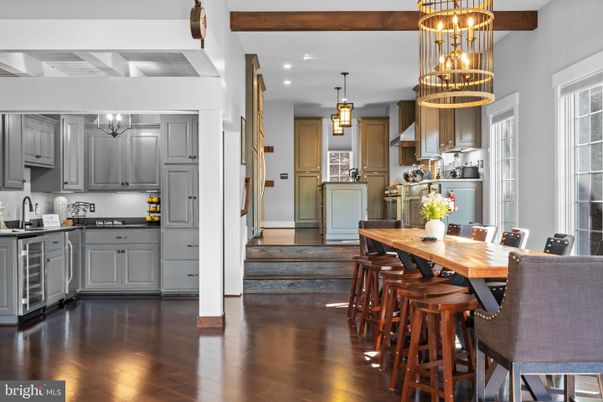 Chandelier, Dining room, Interior, Kitchen, Pendant Lights, Recessed Lighting, Stainless Steel Appliances, Wooden Beams, Wood Texture Flooring