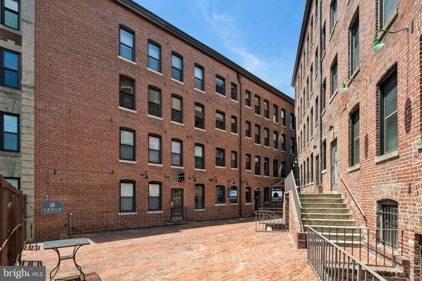 Exterior, Facade, Brick Facade, Condo Building