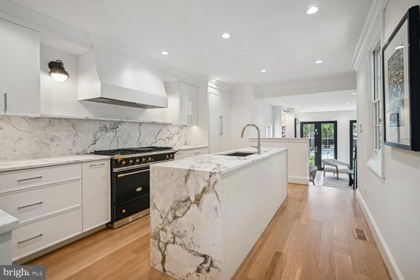 Interior, Kitchen, Marble Walls, Recessed Lighting, Wood Texture Flooring