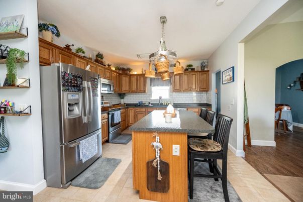 Dining room, Interior, Kitchen, Recessed Lighting, Stainless Steel Appliances, Wood Texture Flooring