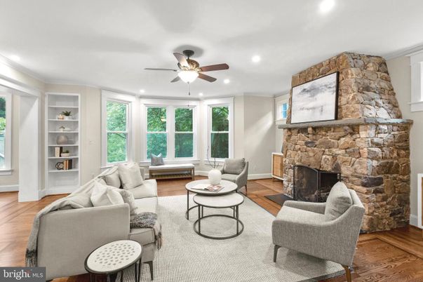 Fireplace, Interior, Living room, Recessed Lighting, Stone Walls, Wood Texture Flooring