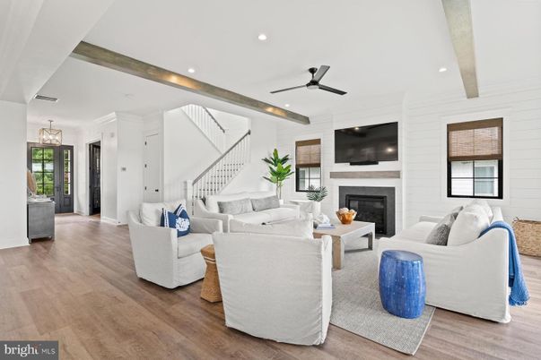 Fireplace, Interior, Living room, Pendant Lights, Recessed Lighting, Stone Walls, Wood Texture Flooring