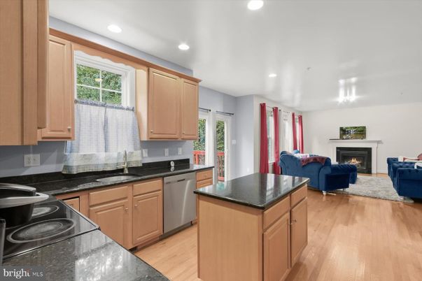 Fireplace, Interior, Kitchen, Living room, Recessed Lighting, Wood Texture Flooring