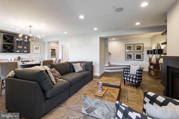Dining room, Fireplace, Interior, Living room, Pendant Lights, Recessed Lighting, Wood Texture Flooring