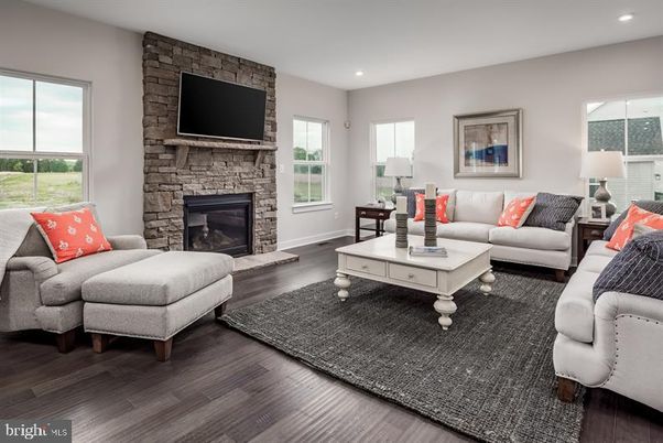 Fireplace, Interior, Living room, Recessed Lighting, Stone Walls, Wood Texture Flooring