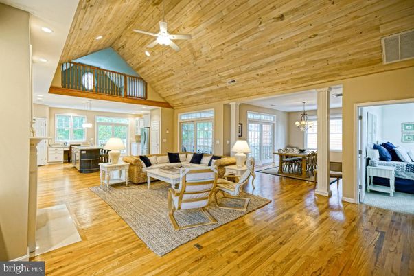 Chandelier, Dining room, Interior, Living room, Pendant Lights, Recessed Lighting, Wooden Ceilings, Wood Texture Flooring