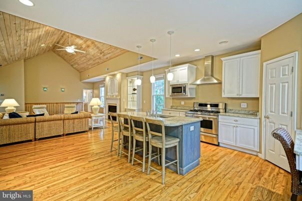 Interior, Kitchen, Living room, Pendant Lights, Recessed Lighting, Stainless Steel Appliances, Wooden Ceilings, Wood Texture Flooring