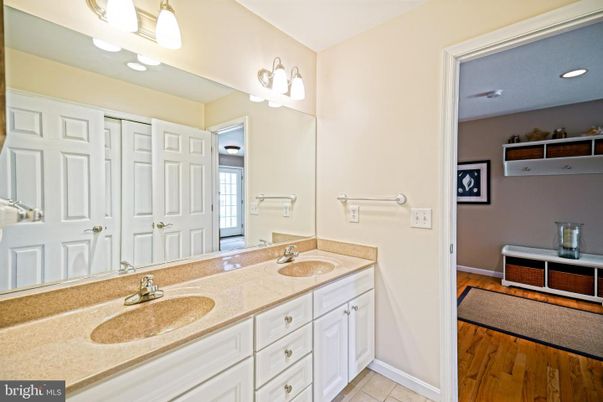 Bathroom, Dual Sink Vanities, Interior, Recessed Lighting, Wood Texture Flooring