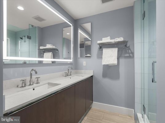 Bathroom, Dual Sink Vanities, Glass Shower, Interior, Recessed Lighting, Wood Texture Flooring
