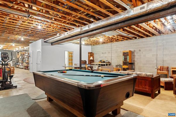 Billiard Table, Fitness Equipment, Game Room, Interior, Stone Walls, Wooden Beams