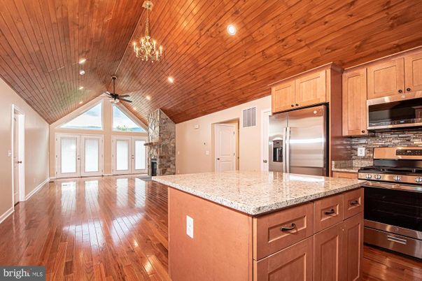 Chandelier, Interior, Kitchen, Recessed Lighting, Stainless Steel Appliances, Wooden Ceilings, Wood Texture Flooring