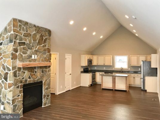 Fireplace, Interior, Kitchen, Recessed Lighting, Stone Walls, Wood Texture Flooring