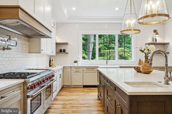 Interior, Kitchen, Pendant Lights, Recessed Lighting, Stainless Steel Appliances, Stone Walls, Wood Texture Flooring