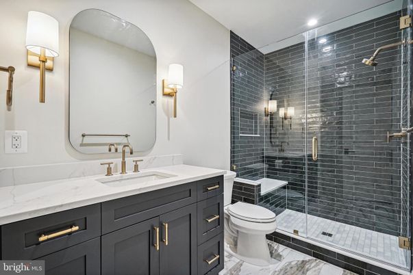 Bathroom, Dual Sink Vanities, Glass Shower, Interior, Marble, Recessed Lighting