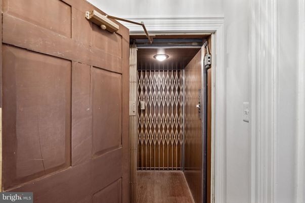 Elevator, Interior, Wooden Walls