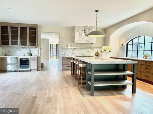 Interior, Kitchen, Marble Walls, Pendant Lights, Recessed Lighting, Stainless Steel Appliances, Wood Texture Flooring