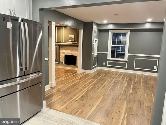 Fireplace, Interior, Kitchen, Recessed Lighting, Stainless Steel Appliances, Wood Texture Flooring