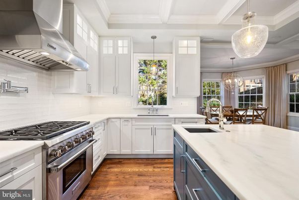 Chandelier, Dining room, Interior, Kitchen, Pendant Lights, Stainless Steel Appliances, Wood Texture Flooring