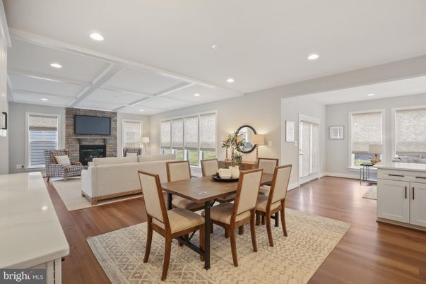 Dining room, Fireplace, Interior, Living room, Recessed Lighting, Wood Texture Flooring