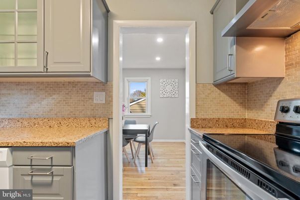 Dining room, Interior, Kitchen, Recessed Lighting, Stainless Steel Appliances, Wood Texture Flooring