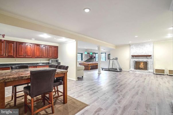 Fireplace, Interior, Kitchen, Recessed Lighting, Wood Texture Flooring