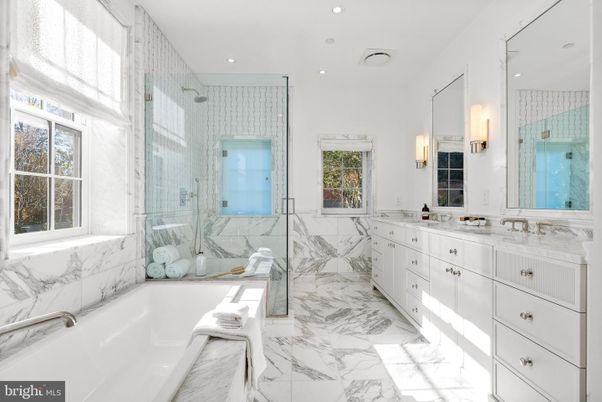 Bathroom, Dual Sink Vanities, Glass Shower, Interior, Marble, Marble Walls, Recessed Lighting