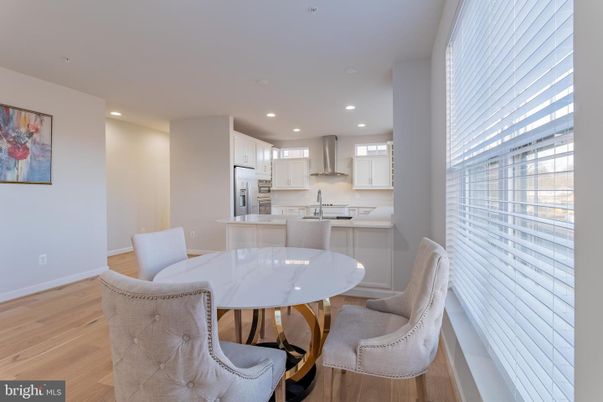 Dining room, Interior, Kitchen, Recessed Lighting, Stainless Steel Appliances, Wood Texture Flooring