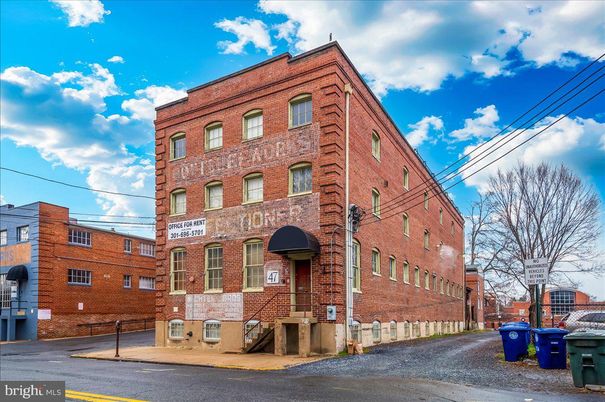Exterior, Facade, Brick Facade, Condo Building