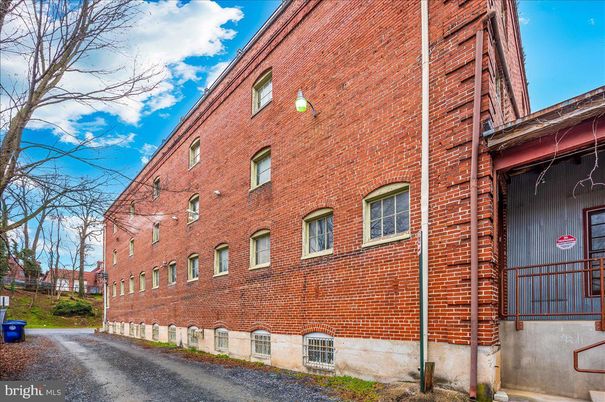 Exterior, Facade, Brick Facade, Condo Building