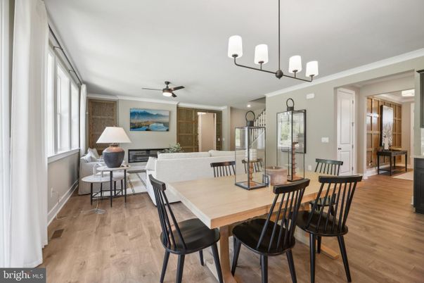 Dining room, Fireplace, Interior, Living room, Pendant Lights, Recessed Lighting, Wood Texture Flooring