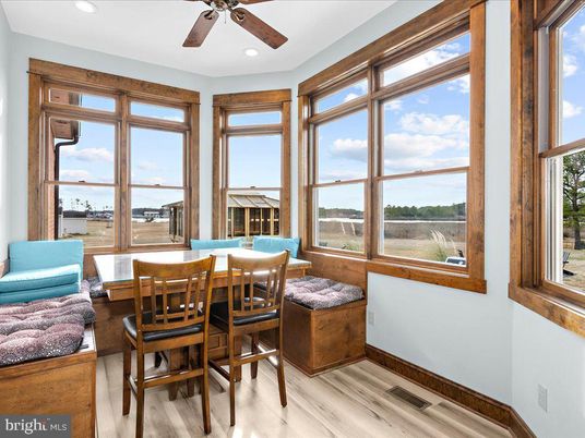 Dining room, Interior, Recessed Lighting, Sun Room, Water, Wood Texture Flooring