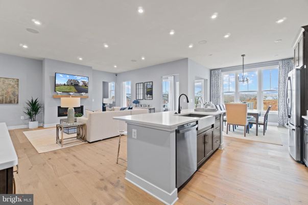 Dining room, Fireplace, Interior, Kitchen, Living room, Pendant Lights, Recessed Lighting, Stainless Steel Appliances, Wood Texture Flooring